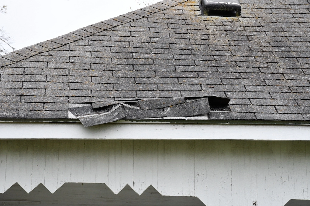 roof replacement insurance guide broken shingles