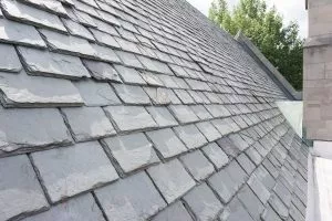 Slate roofing tiles on a historic buildings. Slate is an exceptionally durable building material.