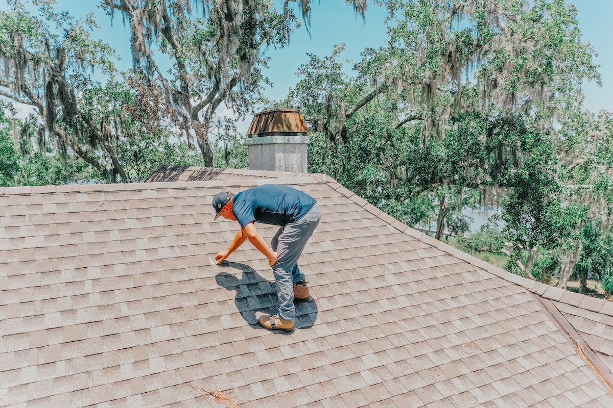 Monarch employees inspecting roof in NC