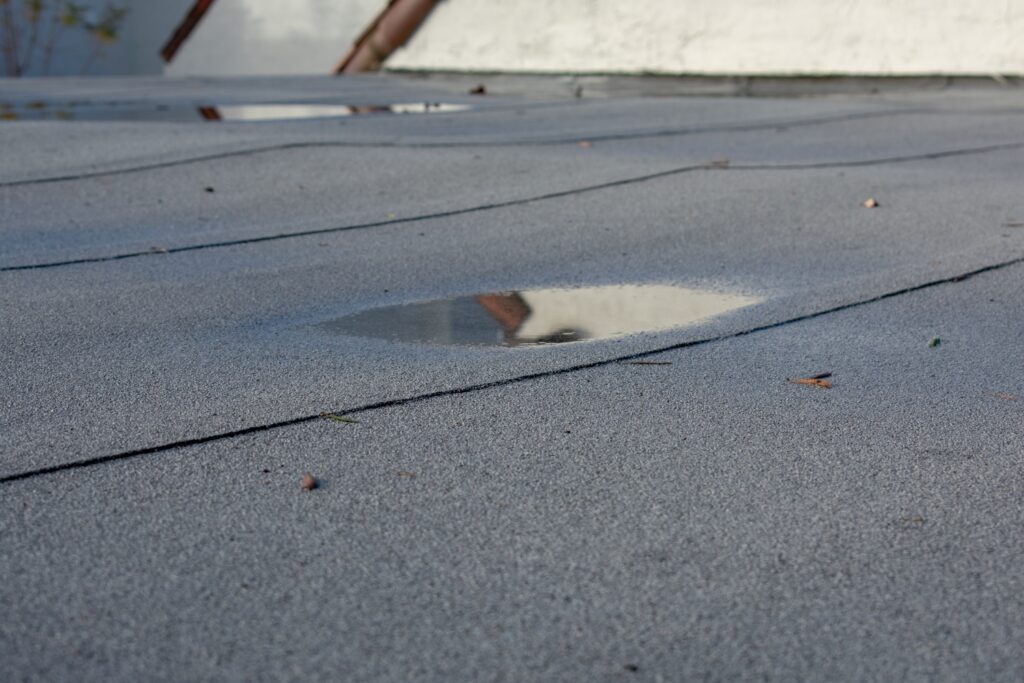 commercial roof inspection dealing with roof sagging