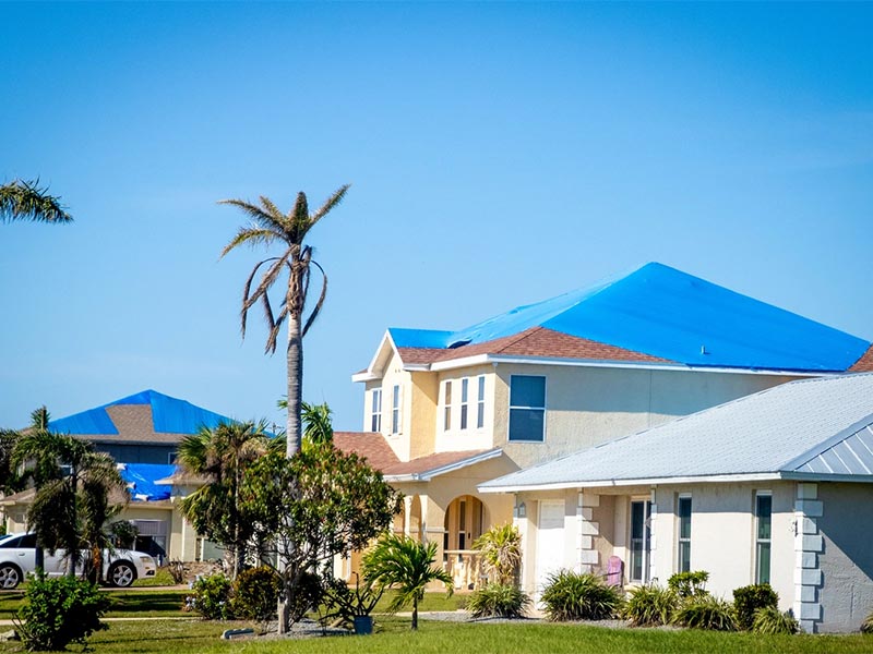 Featured image for “How to Tarp a Roof: A Step by Step Guide for 2023”