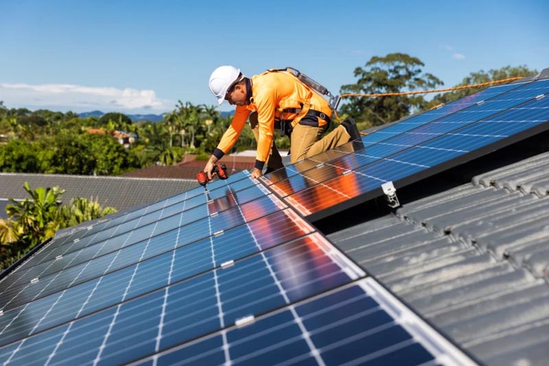 Man installing new solar panel