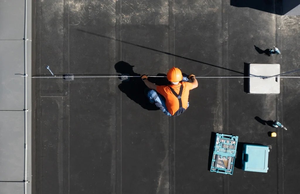 A person working on a roof
