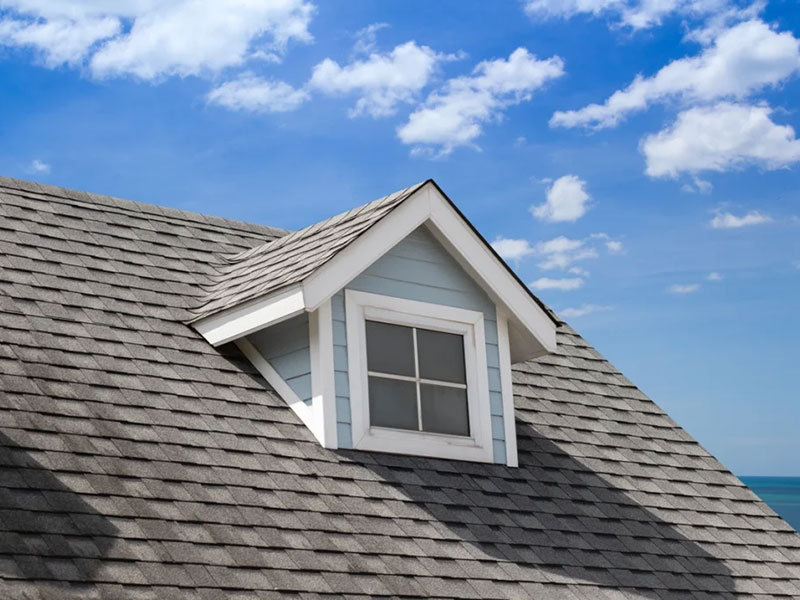 streaks on roof blue sky