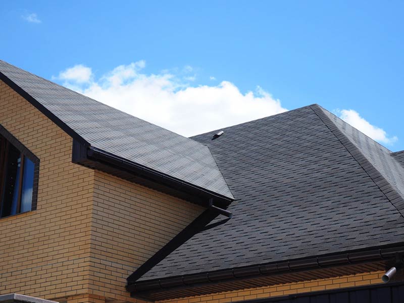 Featured image for “4 Pros & Cons to Composite Roof Shingles (Homeowner’s Guide)”