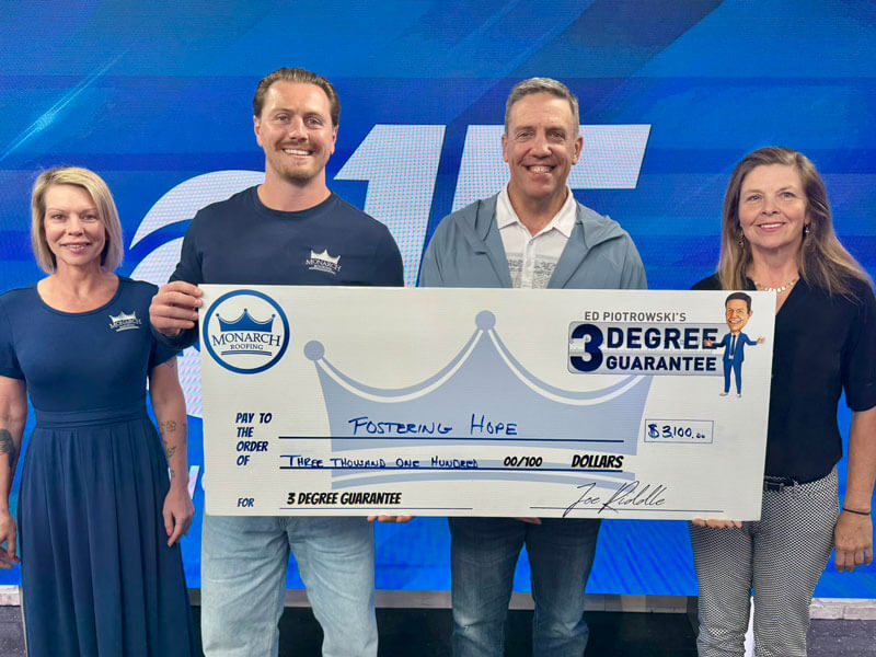 community fundraising check presentation to Fostering Hope by Monarch Roofing in partnership with Ed Petrowski’s 3 Degree