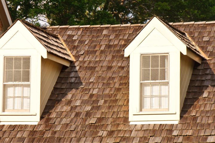 cedar shake roof-white sided house with cedar shake roof