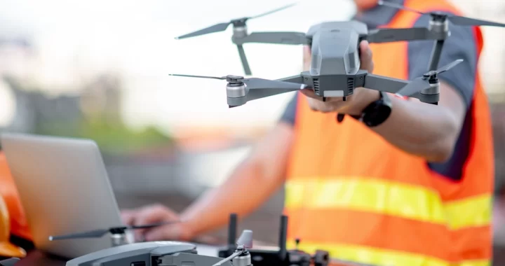 contractor prepares for drone roof inspection