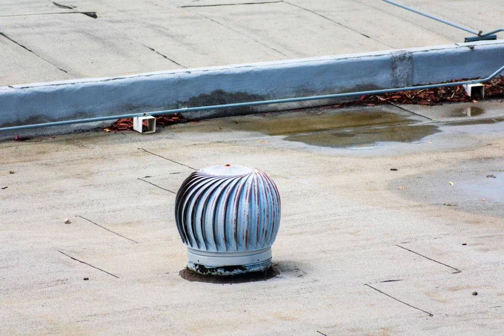 close up to turbine ventilation on flat roof