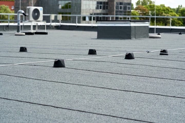 gray roof material on a flat roof