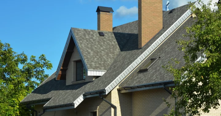 modern residential house roof pitch with chimneys