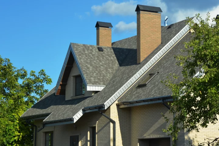 modern residential house roof pitch with chimneys