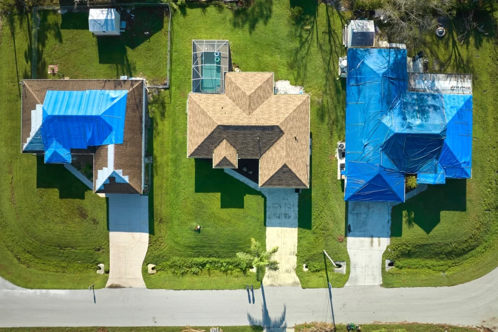 aerial view of residential roof tarping