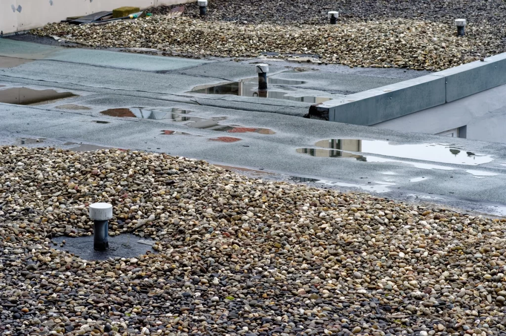 pooling water on a tar and gravel roof