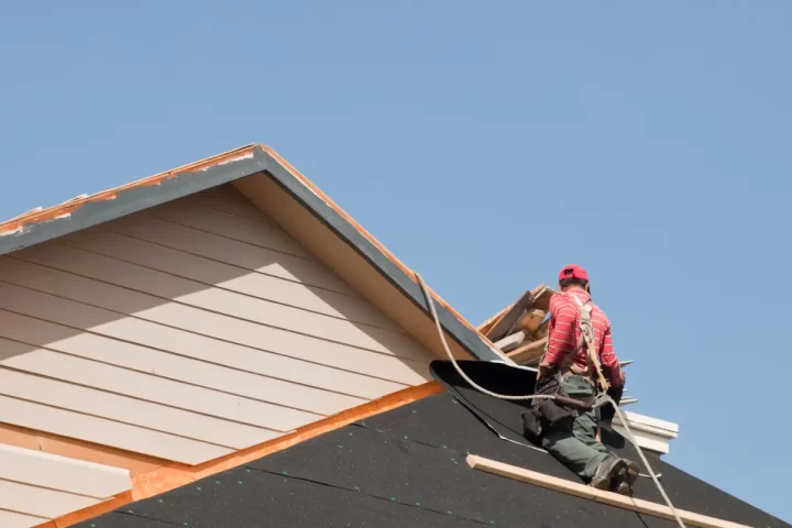 roofer replacing old roof