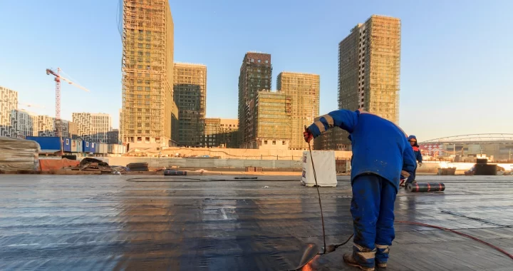 working on commercial roof