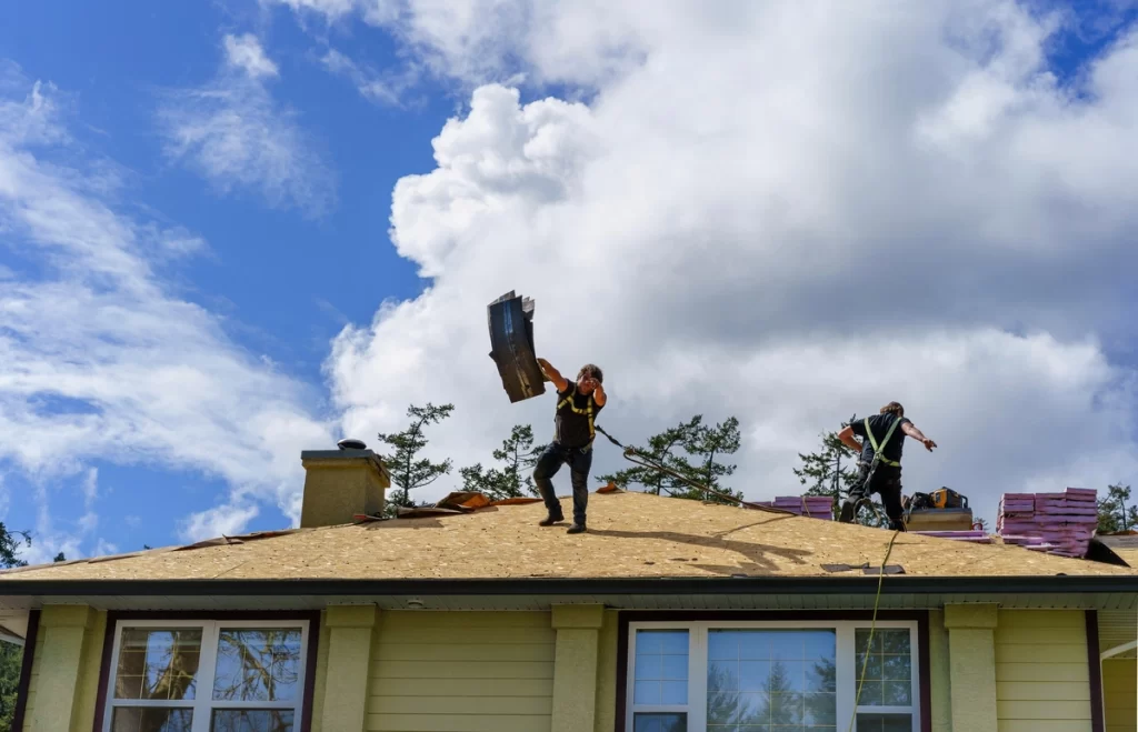 man working on roof