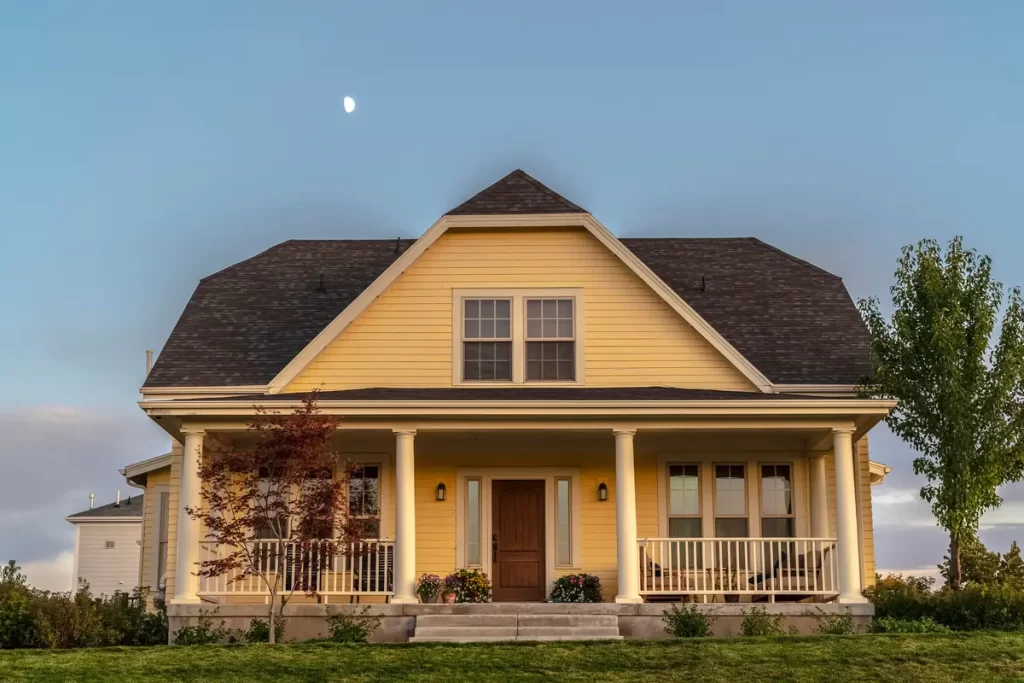 yellow house and moon