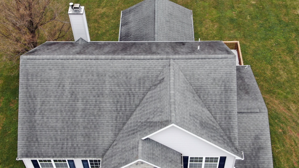 aerial view of residential roof; how long does it take to replace a roof